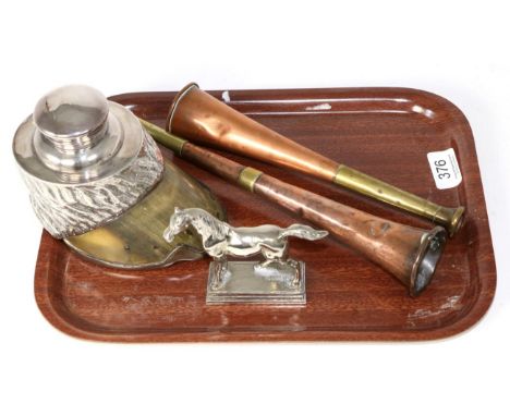 An electroplate mounted horse hoof inkwell; two copper and brass hunting horns, one marked George Smith, Birmingham; and a ca
