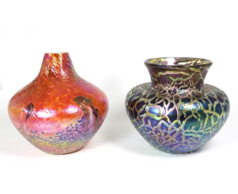 John Ditchfield for Glasform; an iridescent orange lava vase, decorated with speckles and surface swirls etched to base J. Di