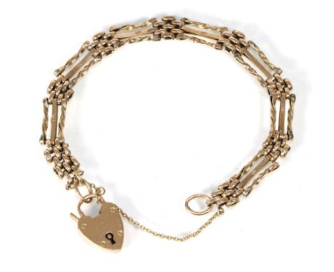A fancy gate link bracelet, with padlock clasp, length 19cm, stamped '9CT'.  11.5g