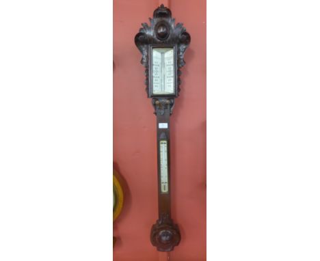 A Victorian carved oak stick barometer, the ivory coloured dial signed J. Brunner, Edgbaston Street, Birmingham 