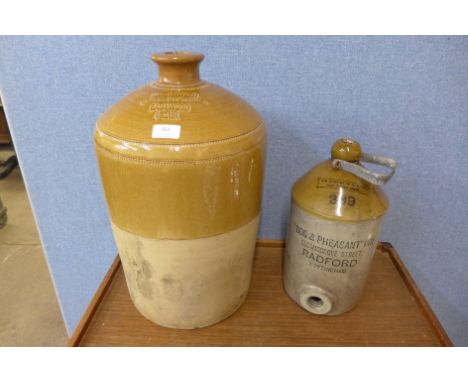 Two Nottingham stoneware flagons, Dog &amp; Pheasant Inn, Radford and Henry Wyld, Eastwood 