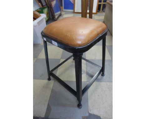 A painted metal stool 