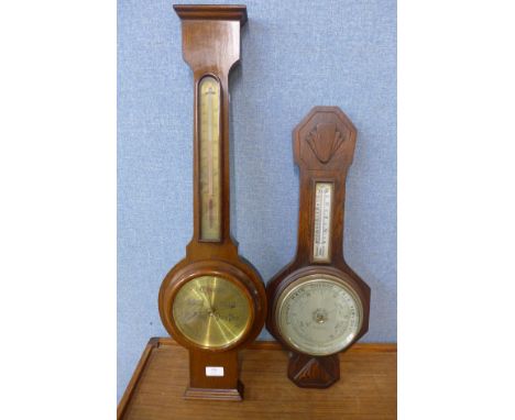 An oak aneroid barometer, the brass dial signed Nedham, Leicester and another aneroid barometer, signed Bravingtons Ltd., Kin