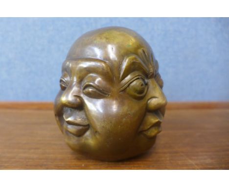 A small bronze four faced Buddha 