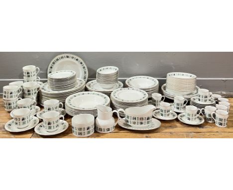 A Royal Doulton 'Tapestry' tea and dinner service with gilt edges and fruit decoration, comprising fourteen large plates (w- 