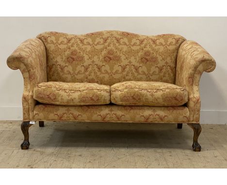 A quality George III style camel back sofa, the frame and squab cushions upholstered in cotton with acanthus leaf motif, rais