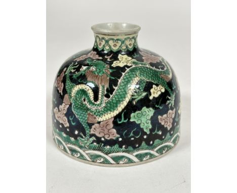 A late 19th- early 29thc Chinese Famille Noir brush washer pot of circular domed shape, decorated with two five claw Dragons 