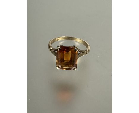 A 9ct gold ring set cushion cut citrine mounted in four claw setting, N, (L x 1cm x W x 0.76cm), 2.8g