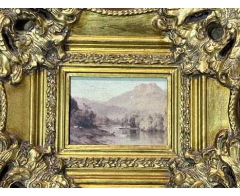 A landscape print in moulted gilt rococo style frame. (39cmx43cm)