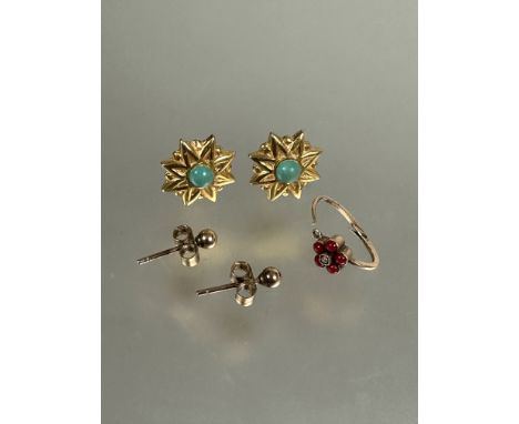 A yellow metal earring/nose ring set five pink coral beads and central seed pearl, and a pair of eastern yellow metal floral 