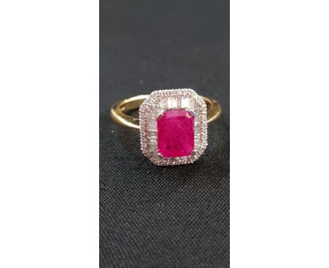 18CT GOLD RUBY AND DIAMOND RING 1.5 CARAT RUBY AND 0.5 CARAT OF DIAMONDS