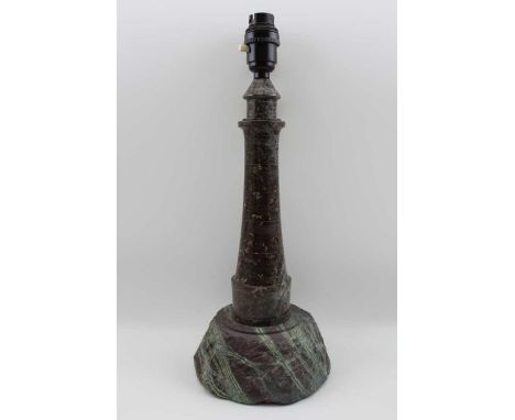 A turned and polished Cornish serpentine table lamp in a form of a light house 34cm tall (excluding fitting)