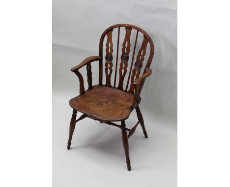 19th century stick and slat back country armchair with carved bull's-eye roundels with well figured solid seat on four splaye