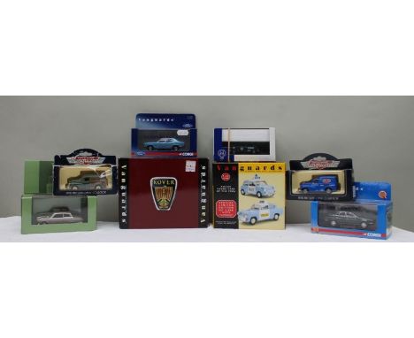  DIE CAST MODEL VEHICLES boxed and mint, including Rover, Police car, etc. (8)