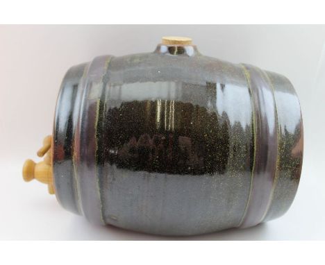 A Winchcombe pottery glazed stoneware barrel with turned wood tap, 26cm