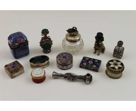 A cast metal pipe tamper, inset Stanhope, a painted cast metal dog ornament wearing top hat with a pipe, 4.5cm high, various 