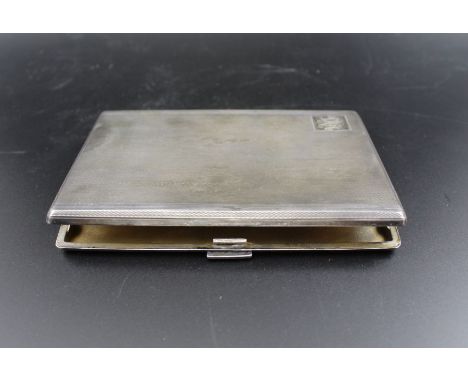 S.J. Rose &amp; Son, silver cigarette case, with engine turned decoration, gilded interior, monogrammed, London 1961, 12.5cm 