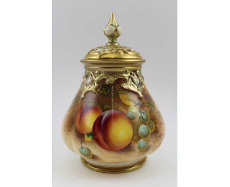 A Royal Worcester porcelain pot pourri vase, with pierced cover, hand painted fruit decoration, signed "Robert", factory mark