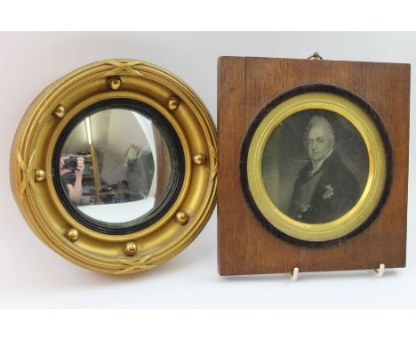A Regency design convex wall mirror, bound reed and ball frame, overall 19cm in diameter, together with a framed engraving, p