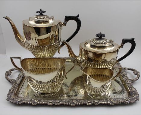 An EPNS four piece tea &amp; coffee service of Georgian design, comprising; tea &amp; coffee pot, sugar bowl and milk jug upo