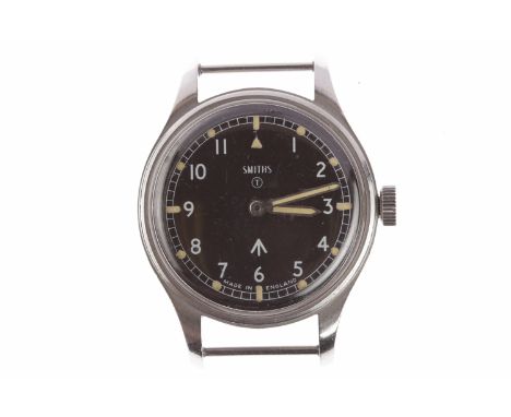 GENTLEMAN'S SMITHS MILITARY ISSUE STAINLESS STEEL MANUAL WIND WRIST WATCH the round black dial with Arabic numerals in white,