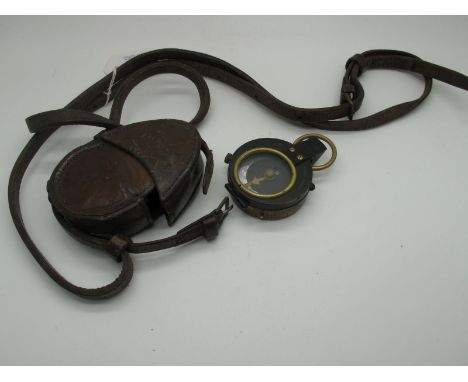 A WWI British Military Compass, by Cruchon and Emons of London, WD Arrow in leather case with strap.