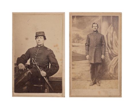 A pair of US Civil War soldier carte de visites. First is an unnamed union soldier with rare calvary kepi style, crossed swor