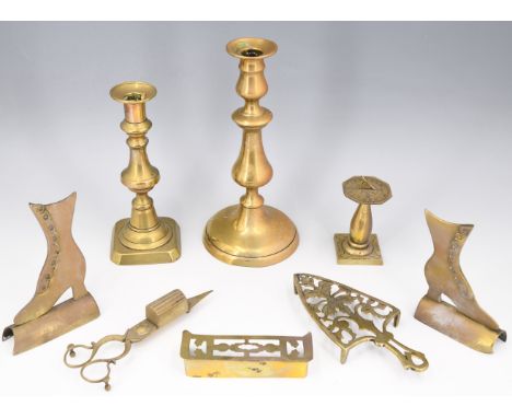 A group of Victorian and later brass, including hearth ornaments in depiction of boots, a diminutive sundial, etc, tallest 24