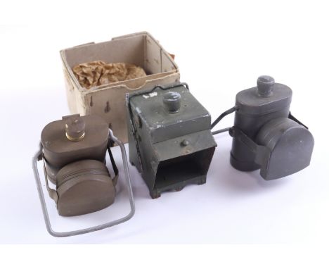 Two Second World War British army No 1 Electric Lamps together with a traffic lamp