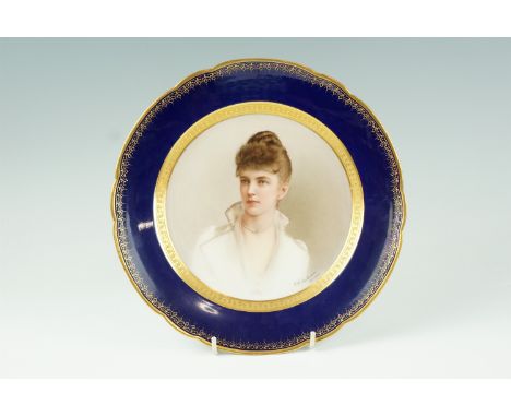 A portrait cabinet plate by Franz Xaver Thallmaier, portraying a well-to-do young woman with quaffed hair, pearl necklace and