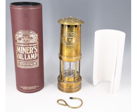 A boxed brass miner's safety lamp by E Thomas &amp; Williams Ltd, with certificate, 25 cm excluding handle 