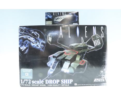 A boxed limited edition Aliens 1/72 scale diecast model Drop Ship together with a boxed 1/72 scale Armored Personnel Carrier,