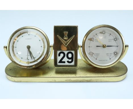 A 1960s gilt metal desk alarm clock, calendar and barometer by Europa, comprising a keyless wind and set seven jewel movement