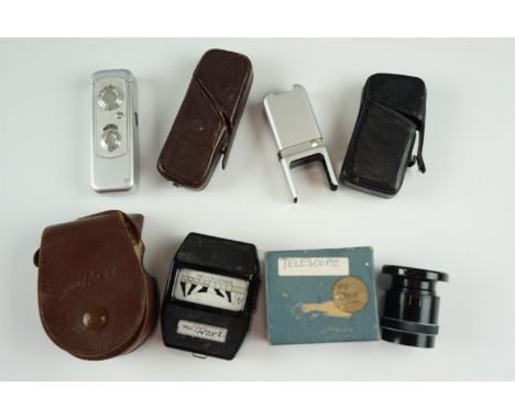 A Minox (Wetzler) leather cased spy camera and a leather cased accessory, together with a Mini Rex II light meter and a boxed