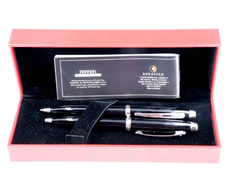 A cased Sheaffer Ferrari pen and propelling pencil set