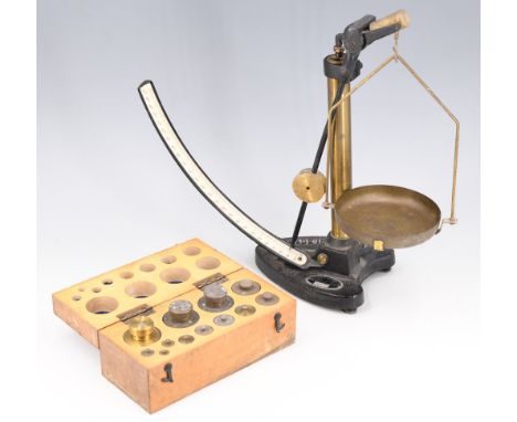 An early 20th Century Griffin &amp; George Ltd cast iron and brass balance scale together with a boxed set of Metric brass we