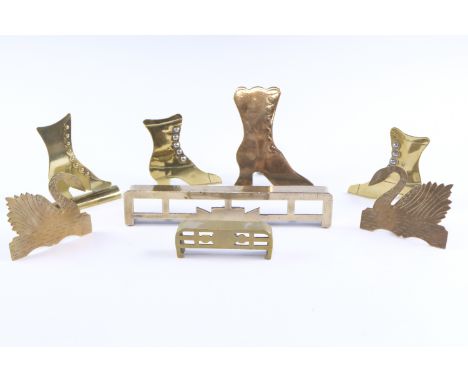 Two pairs of Victorian brass mantle-ornaments, comprising boots having steel button lace-holes, and swans, together with two 