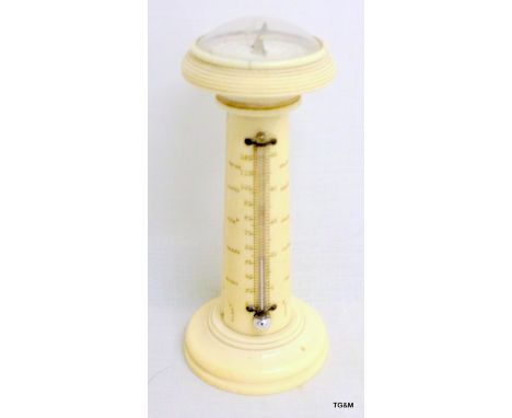 C19th turned ivory column with sundial compass to top and thermometer to the side.  15.5cm high.