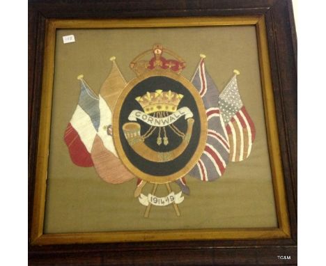 A WW1 framed and glazed embroidery of the badge of the Duke of Cornwall’s Light Infantry size 46x46cm