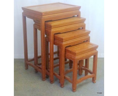 A set of 4 Oriental Rosewood lamp tables highest 69x49x35cm