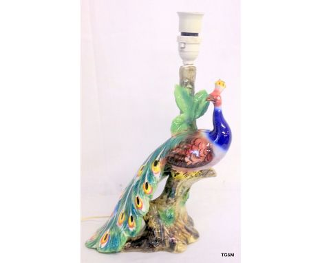 An Italian Majolica table lamp in the form of a peacock 36cm high