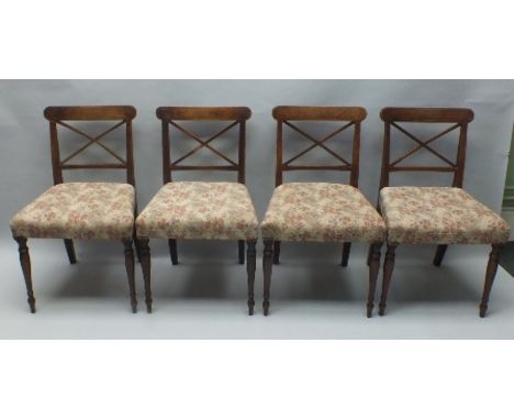 A SET OF FOUR 19TH CENTURY MAHOGANY DINING CHAIRS, with string inlaid cross splat backs, raised on ring turned slender fore s