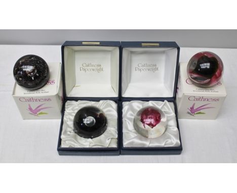 A "CAITHNESS" LIMITED EDITION GLASS PAPERWEIGHT no.509/1000 boxed, together with THREE OTHER "CAITHNESS" PAPERWEIGHTS boxed (