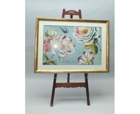 A MAHOGANY FREE-STANDING EASEL, having applied cast brass bow swag, currently displaying a large GRAPHIC FLORAL PRINT by Lisa