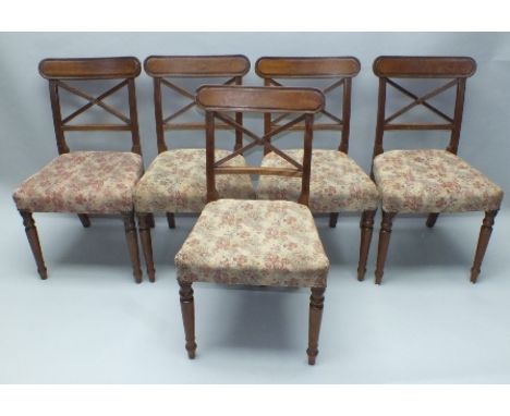 A SET OF FIVE 19TH CENTURY MAHOGANY DINING CHAIRS, each having moulded top rail over cross splat with roundel, tapestry desig