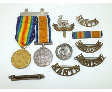 TWO FIRST WORLD WAR MILITARY MEDALS, engraved to the rim '45744 Pte. R.C. Allsop, Hamps R.', together with brass 'Hants' SHOU