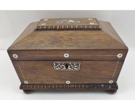 A 19th CENTURY ROSEWOOD TEA CADDY of sarcophagus form with mother-of-pearl inlay and a fitted interior, width 23cm 