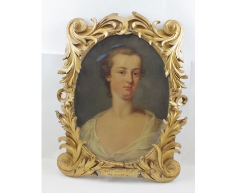 18TH CENTURY ENGLISH SCHOOL "Portrait of a Lady" with blue ribbon in her hair, an oval Oil painting on canvas, the ornate car