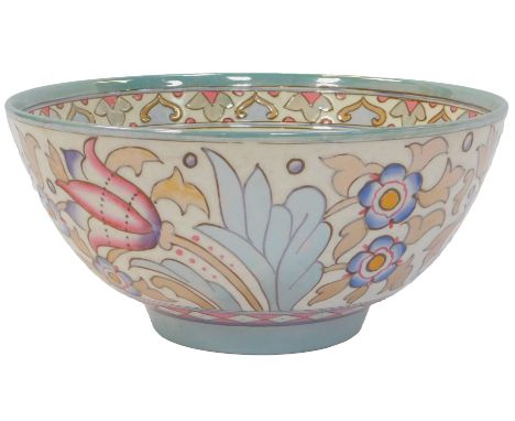 A Bursley ware Charlotte Rhead lustre bowl, decorated with foliate and leaf motifs, in green, purple and pink, printed mark, 