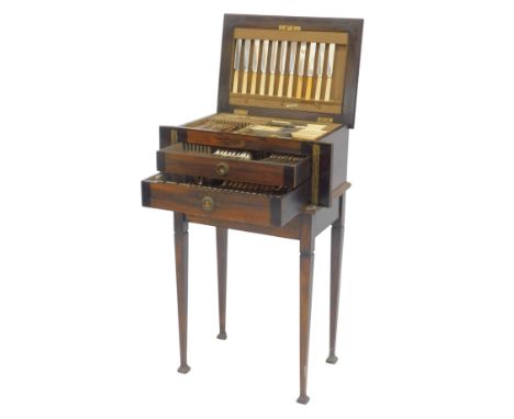 A part canteen of Sheffield Walker &amp; Hall silver plated Old English pattern cutlery, in fitted oak case, with vacant cart